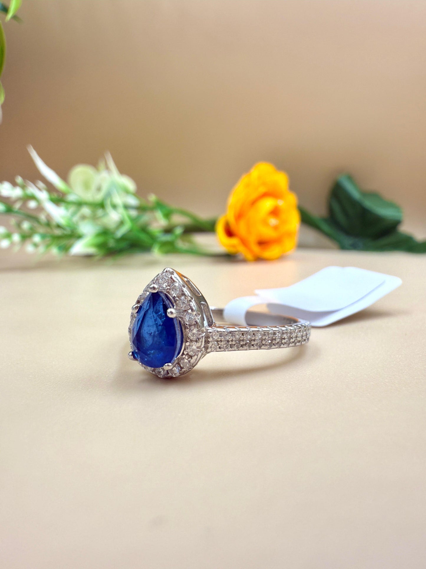 Pear-Shaped Blue Sapphire Zircon Ring