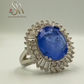 SILVER RING WITH BLUE COLORED STONE