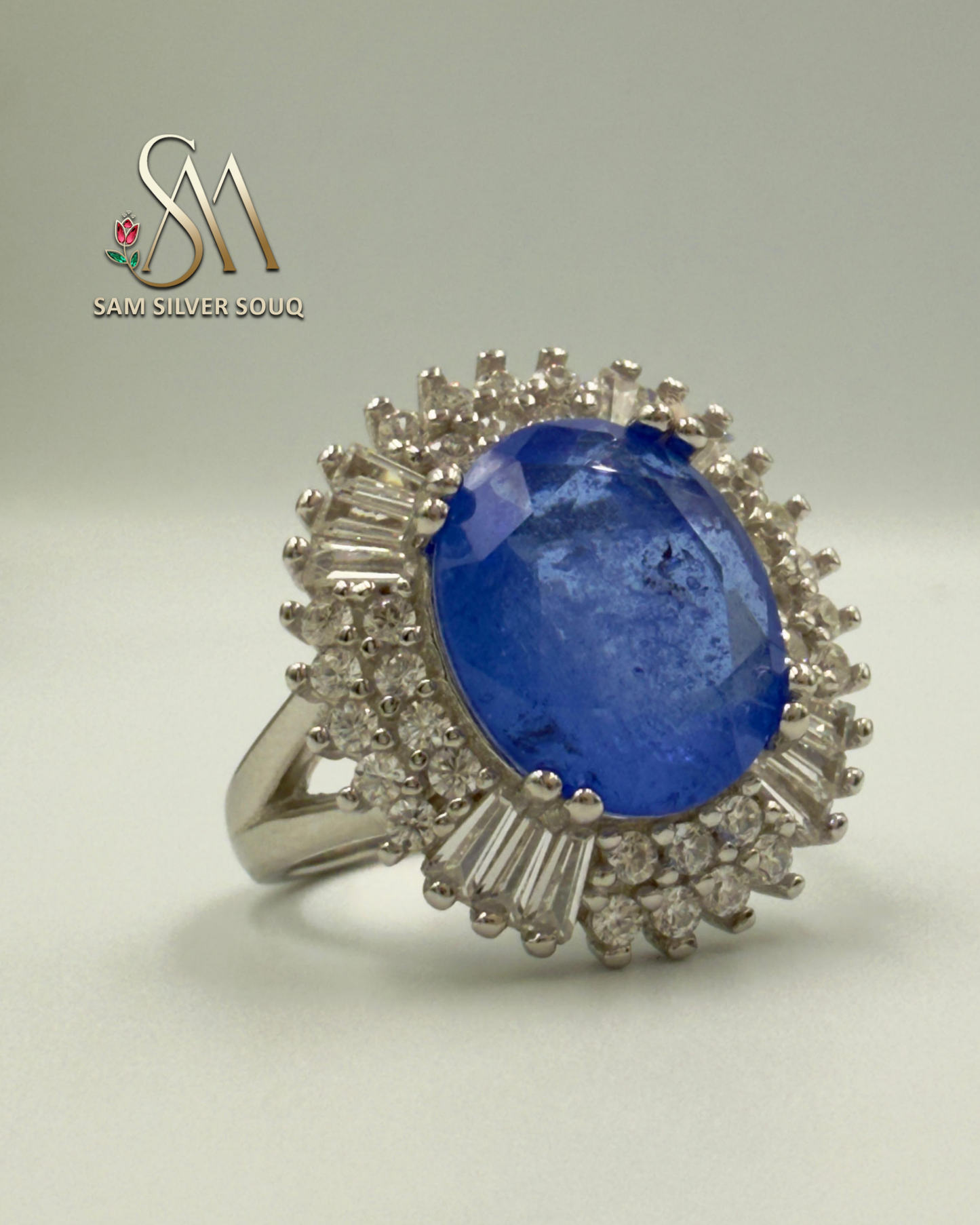 SILVER RING WITH BLUE COLORED STONE