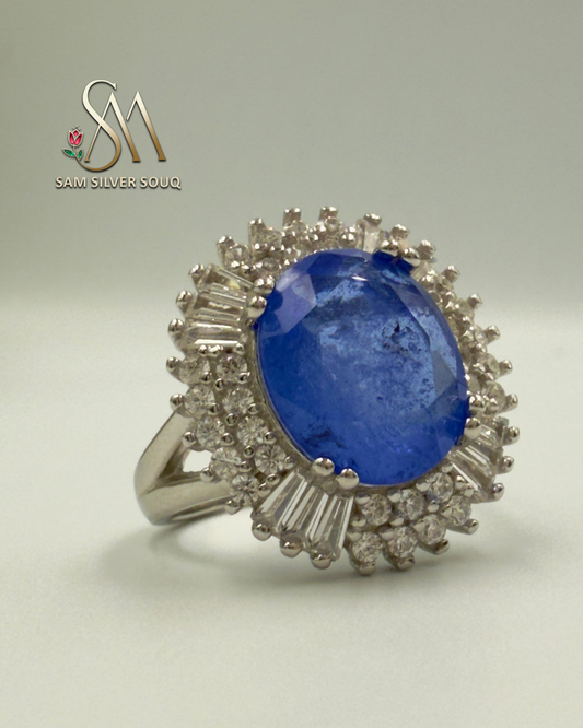 SILVER RING WITH BLUE COLORED STONE