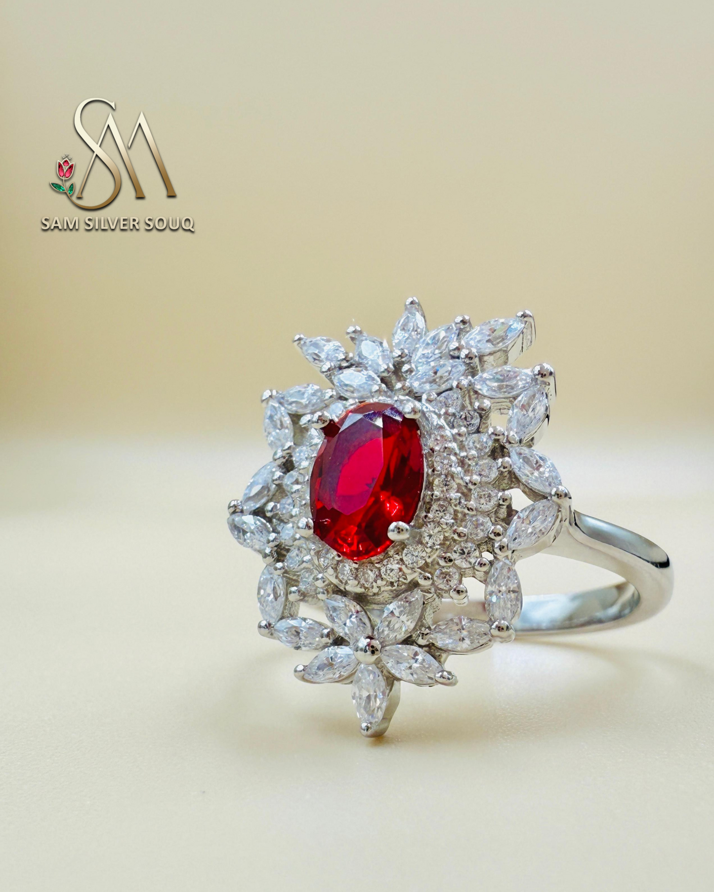 SILVER RING WITH RED COLORED STONE