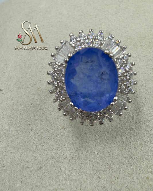 SILVER RING WITH BLUE COLORED STONE