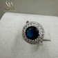 SIVLER RING WITH DARK BLUE COLORED STONE