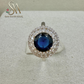 SIVLER RING WITH DARK BLUE COLORED STONE