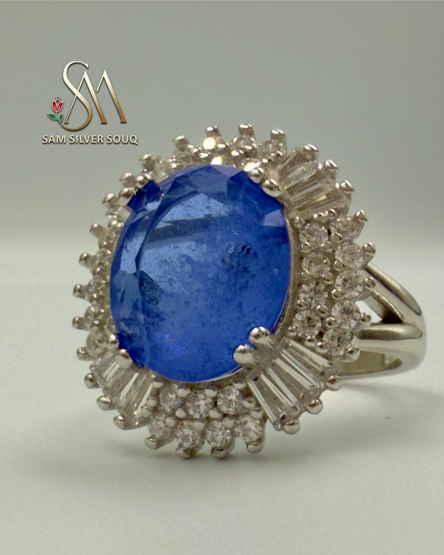 SILVER RING WITH BLUE COLORED STONE