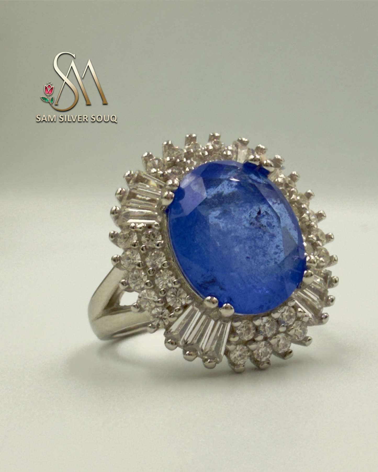 SILVER RING WITH BLUE COLORED STONE