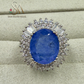 SILVER RING WITH BLUE COLORED STONE