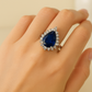 Pear-Shaped Blue Sapphire Zircon Halo Silver Ring