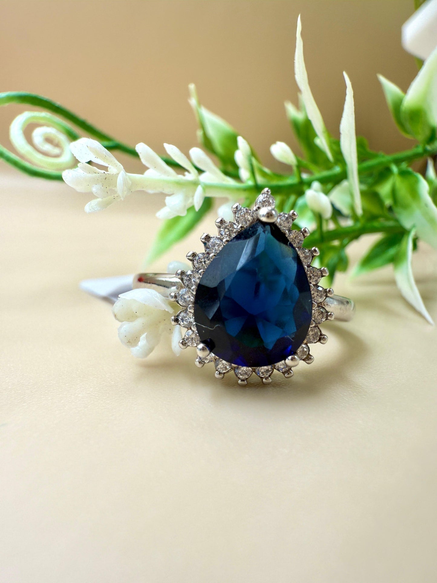 Pear-Shaped Blue Sapphire Zircon Halo Silver Ring