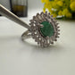 Elegant Emerald & Diamond Halo Ring